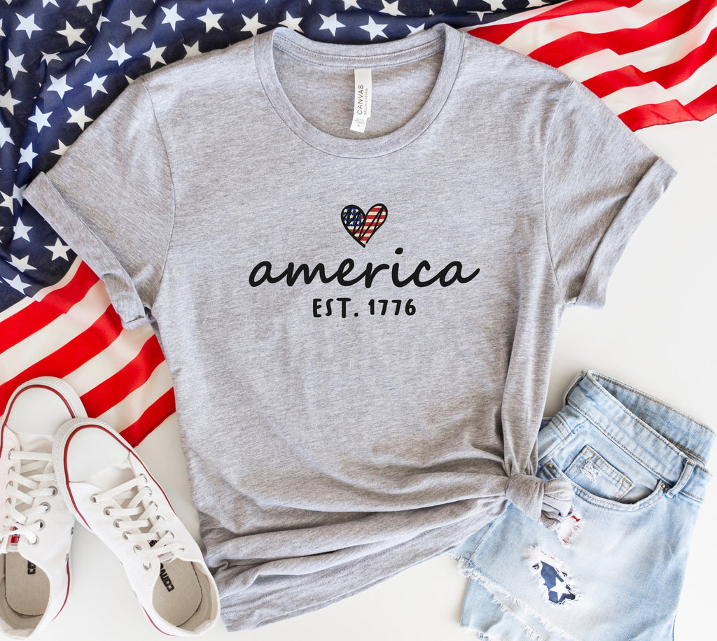 "America Est. 1776" Patriotic T-Shirt - Cute 4th of July Heart Graphic Tee