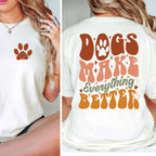White t-shirt with brown paw print on front and 'Dogs Make Everything Better' text on back